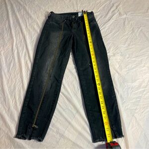 Women black jeans with zipper in the middle.skinny jeans.